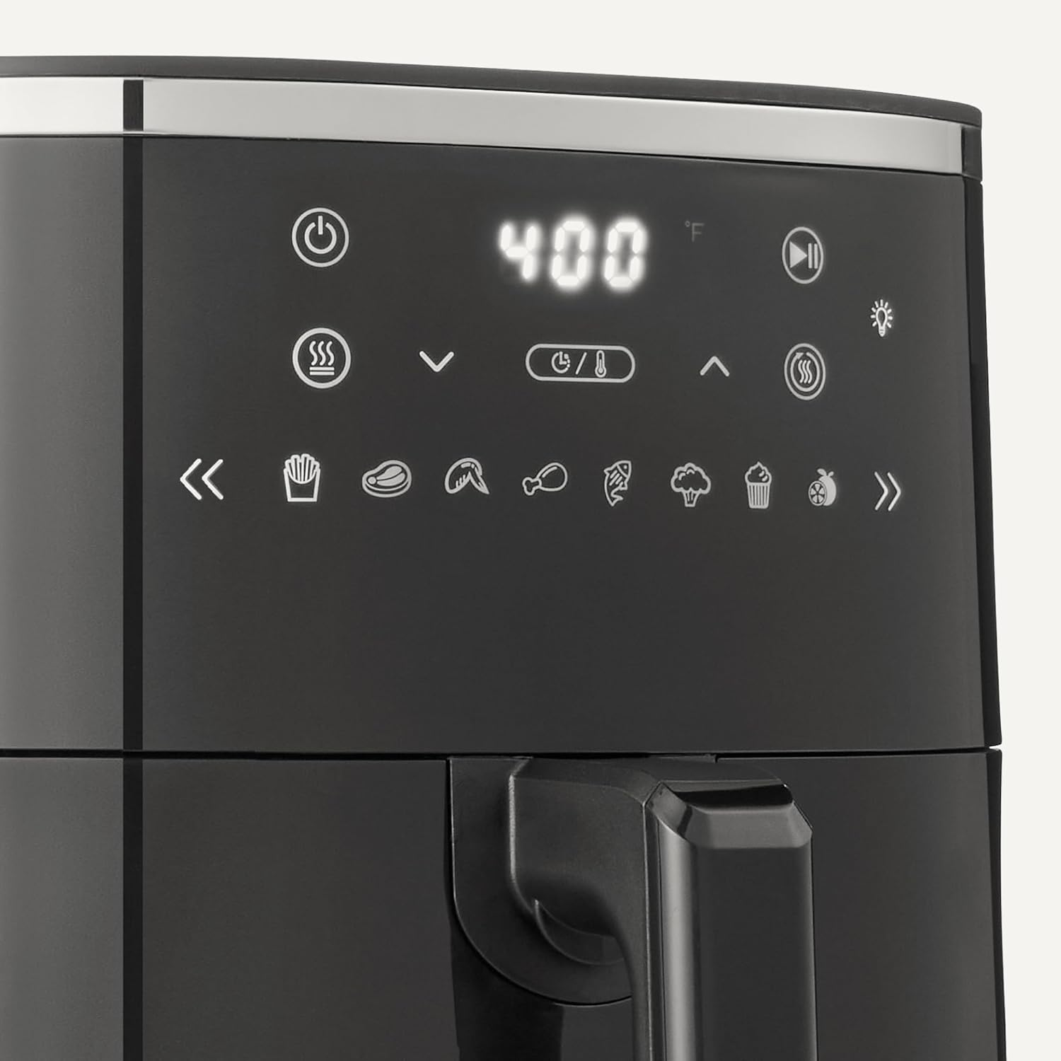 Amazon Basics Air Fryer — food cooking through window